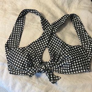 Albion swim top. B&W gingham print with cross back design and front tie detail.